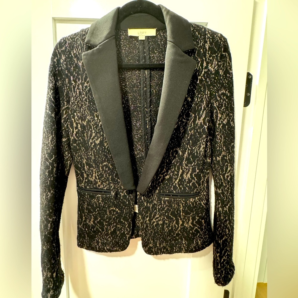 Black and gold tuxedo jacket/blazer.